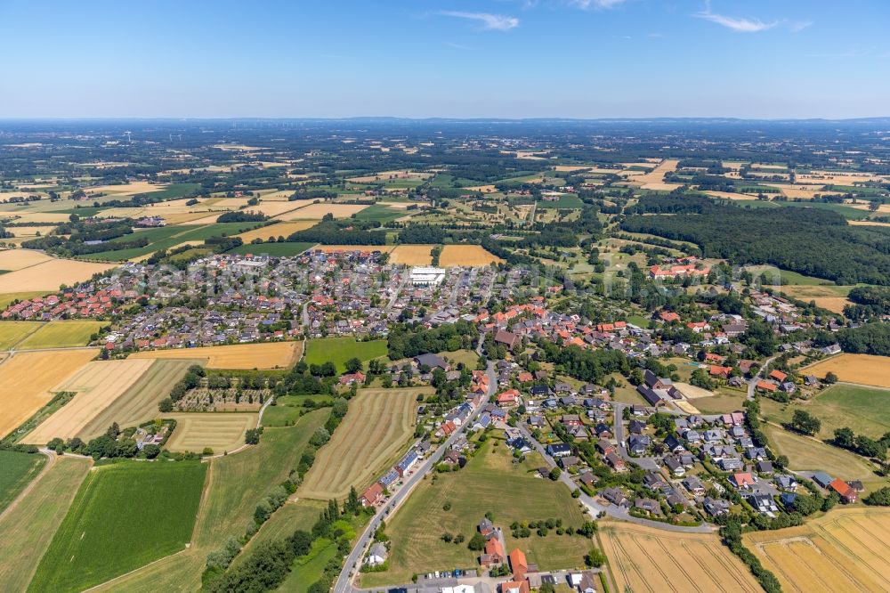 Ostenfelde from above - Town View of the streets and houses of the residential areas in Ostenfelde in the state North Rhine-Westphalia, Germany