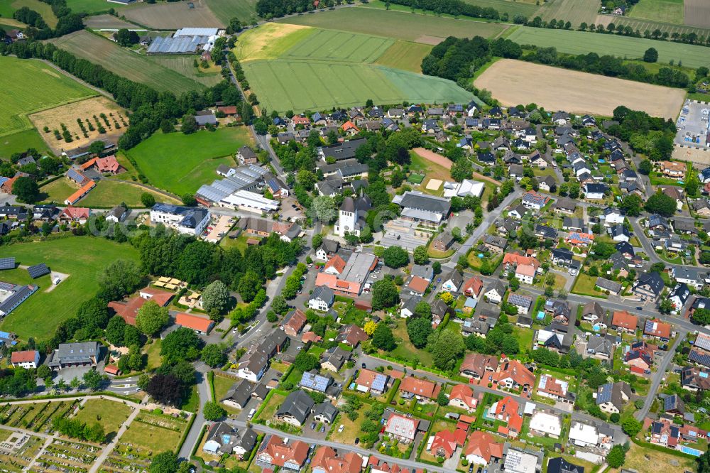 Ostenland from above - Town View of the streets and houses of the residential areas in Ostenland in the state North Rhine-Westphalia, Germany