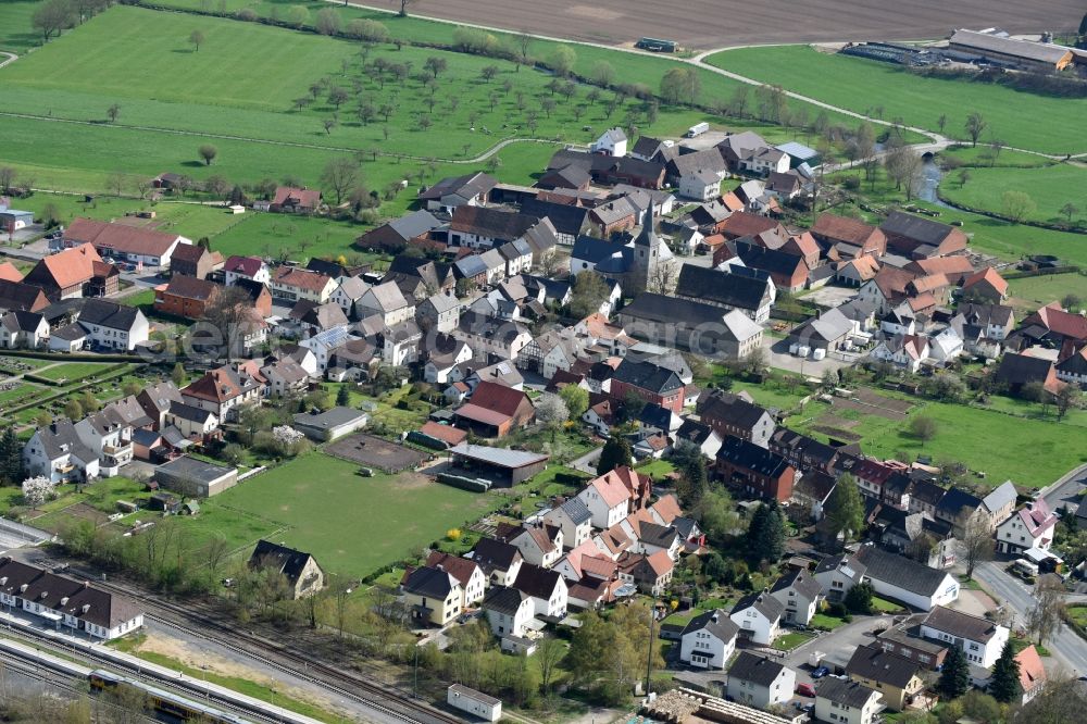 Ottbergen from above - Town View of the streets and houses of the residential areas in Ottbergen in the state North Rhine-Westphalia