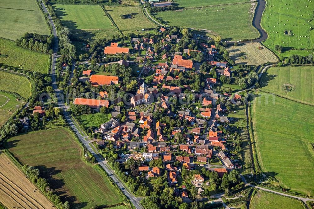 Aerial image Pilsum - Town View of the streets and houses of the residential areas in Pilsum in the state Lower Saxony, Germany