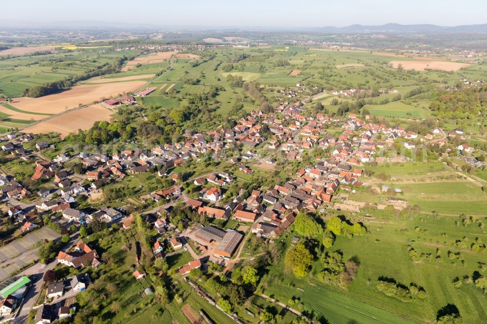 Preuschdorf from the bird's eye view: Town View of the streets and houses of the residential areas in Preuschdorf in Grand Est, France