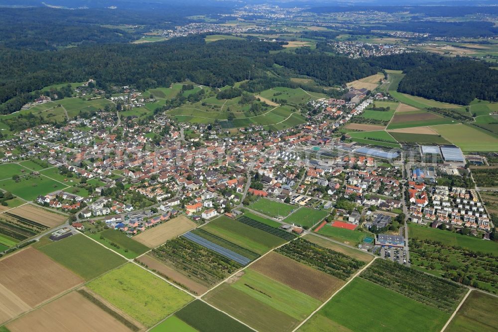 Aerial photograph Rafz - Town view of the streets and houses of the residential areas in Rafz in the canton Zurich, Switzerland