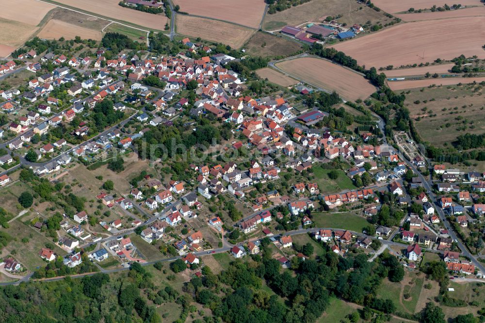 Adelsberg from above - Village view on the edge of agricultural fields and land in Adelsberg in the state Bavaria, Germany