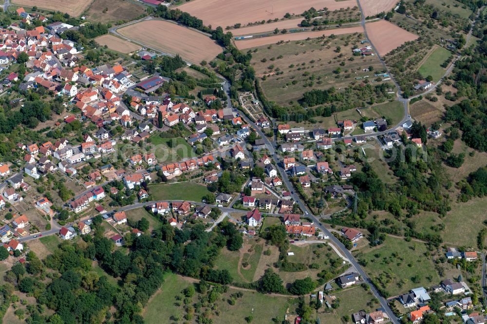 Adelsberg from the bird's eye view: Village view on the edge of agricultural fields and land in Adelsberg in the state Bavaria, Germany