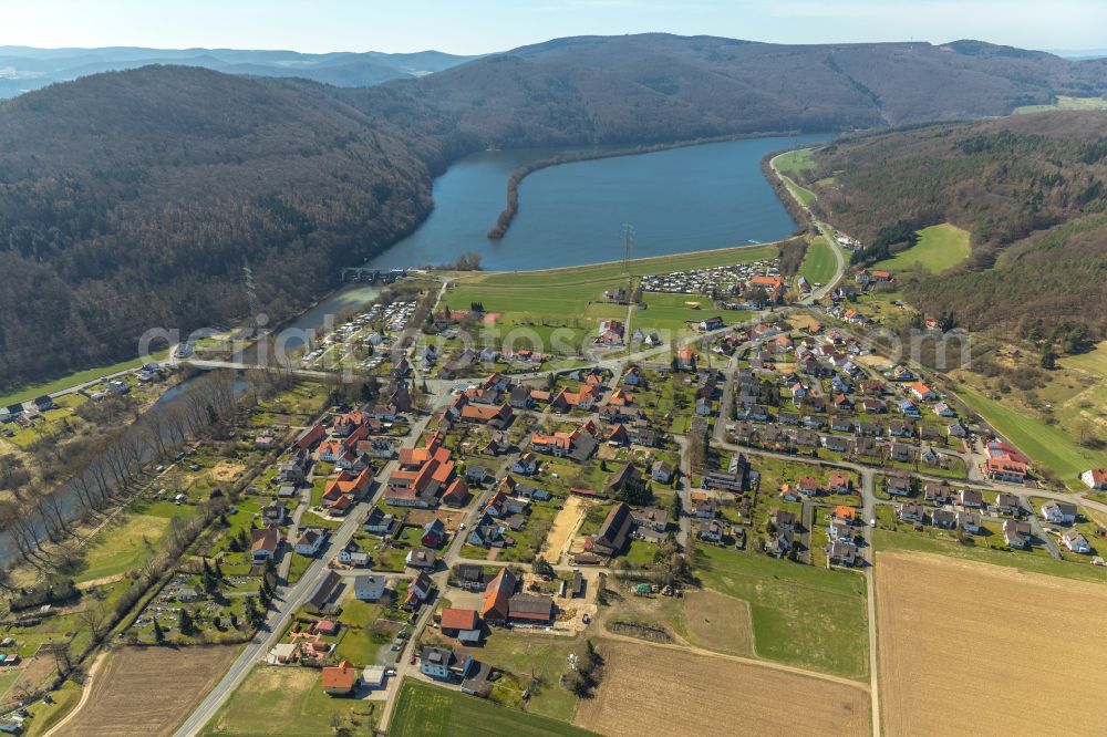 Affoldern from the bird's eye view: Village view on the edge of agricultural fields and land in Affoldern in the state Hesse, Germany