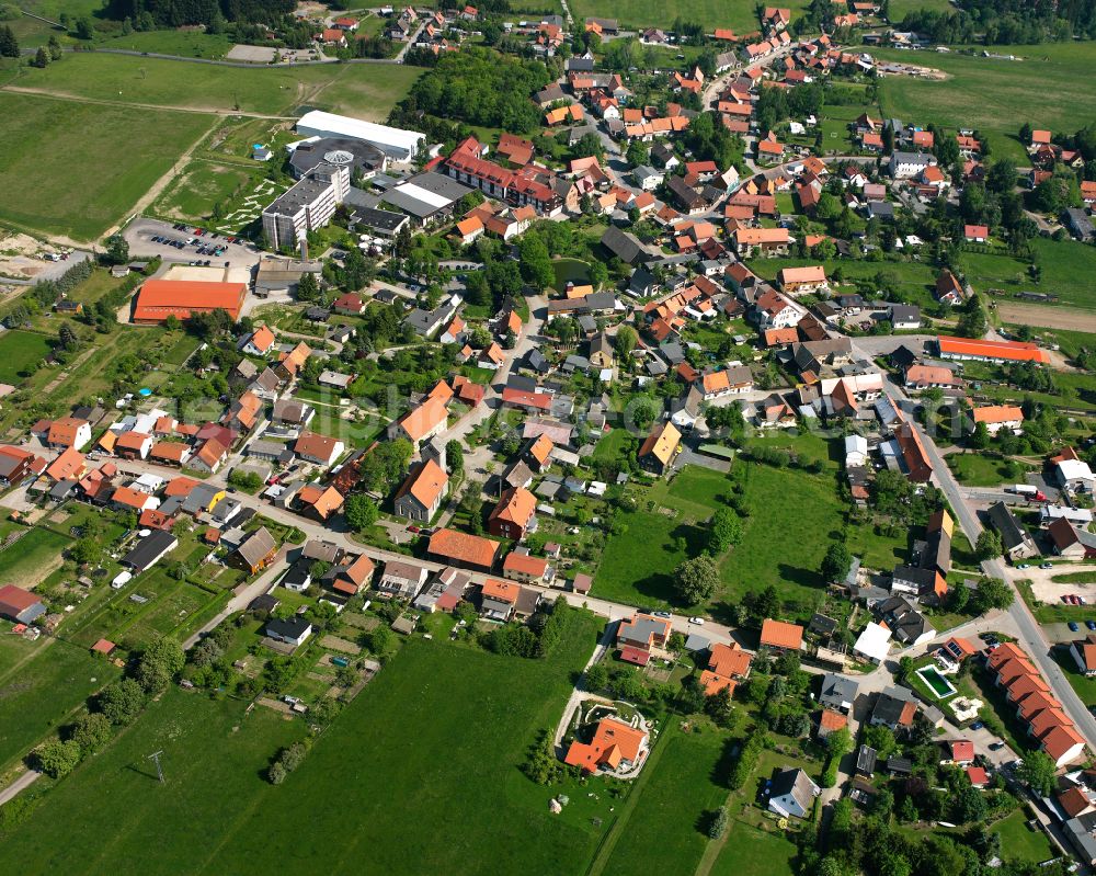 Aerial image Allrode - Village view on the edge of agricultural fields and land in Allrode in the state Saxony-Anhalt, Germany