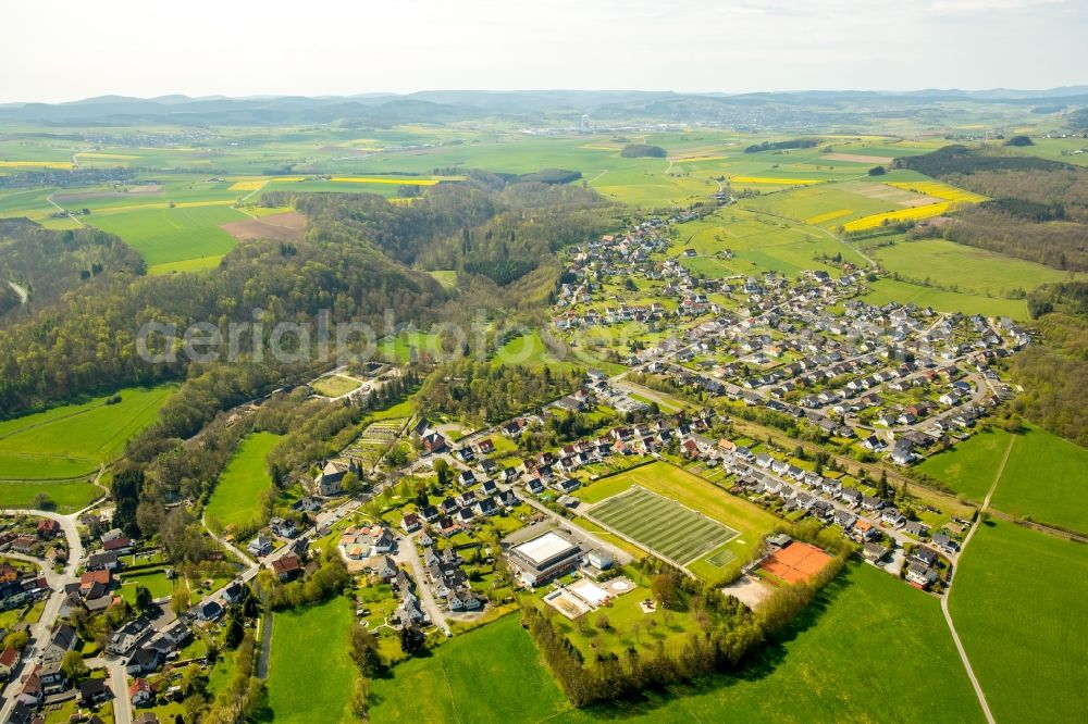 Alme from the bird's eye view: Village view on the edge of agricultural fields and land on Burgstrasse in Alme in the state North Rhine-Westphalia, Germany