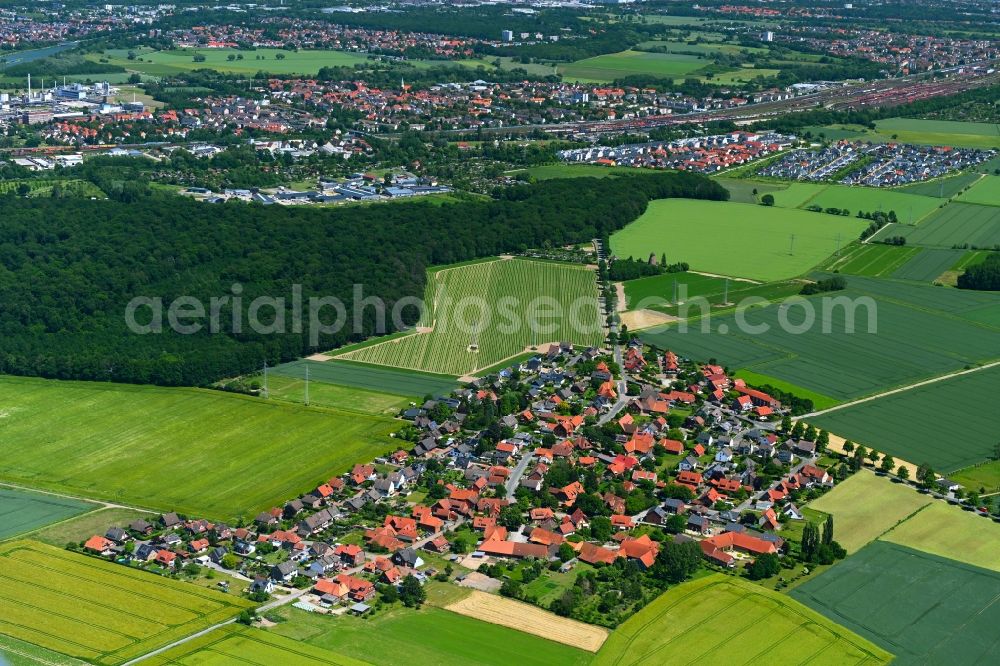 Aerial image Almhorst - Village view on the edge of agricultural fields and land in Almhorst in the state Lower Saxony, Germany