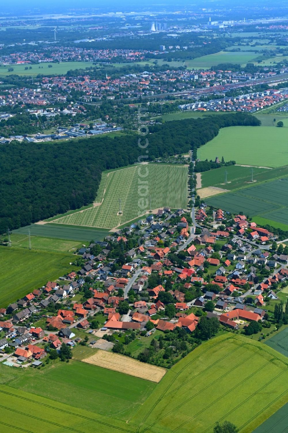 Aerial image Almhorst - Village view on the edge of agricultural fields and land in Almhorst in the state Lower Saxony, Germany