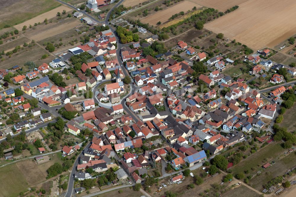 Aerial image Altbessingen - Village view on the edge of agricultural fields and land in Altbessingen in the state Bavaria, Germany