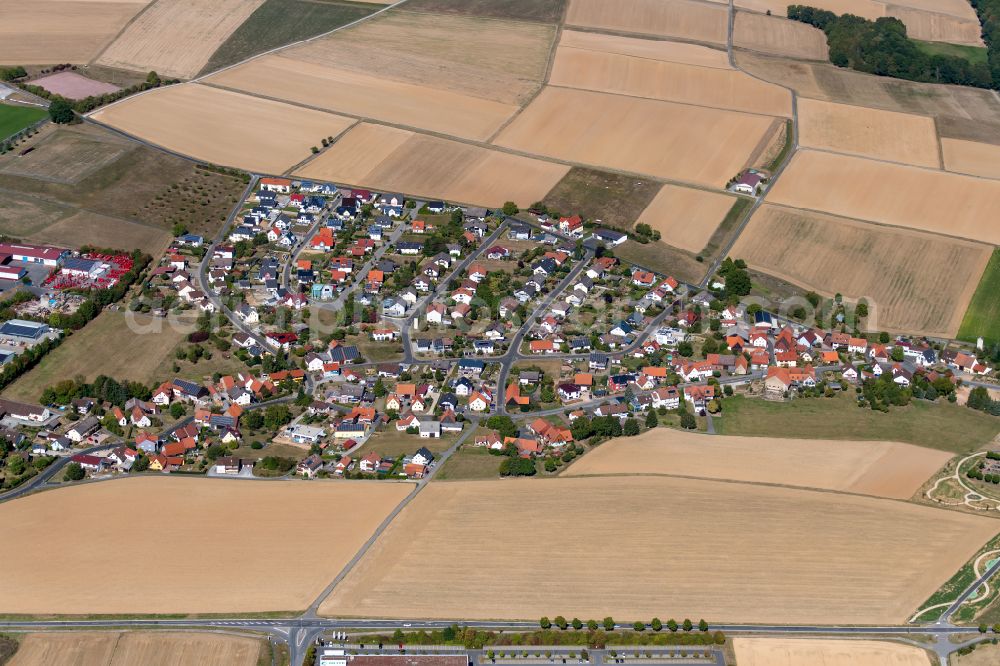 Aerial image Altfeld - Village view on the edge of agricultural fields and land in Altfeld in the state Bavaria, Germany