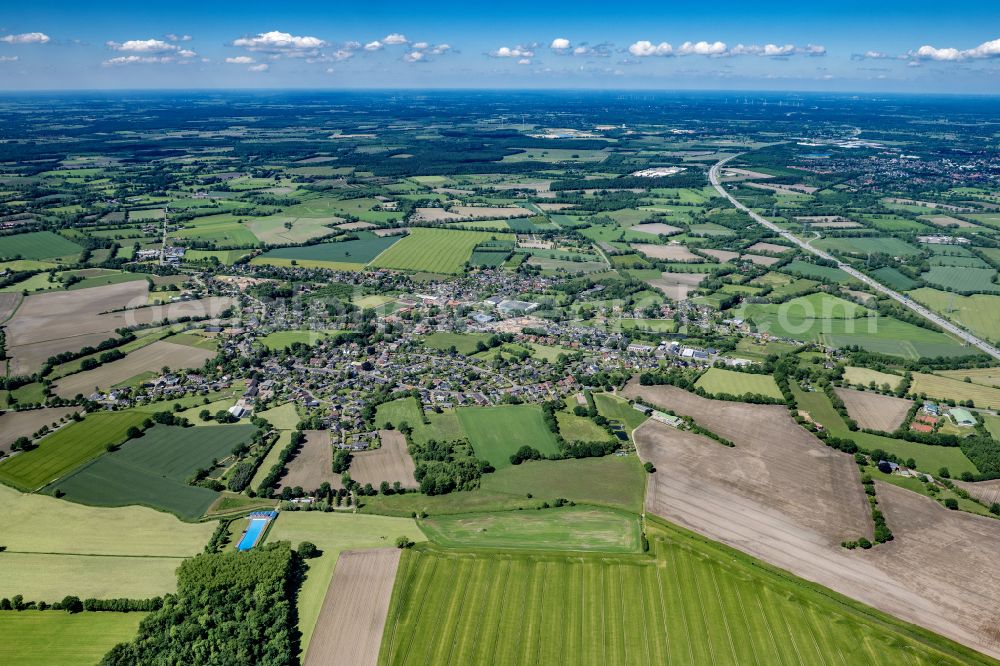 Alveslohe from above - Village view on the edge of agricultural fields and land in Alveslohe in the state Schleswig-Holstein, Germany