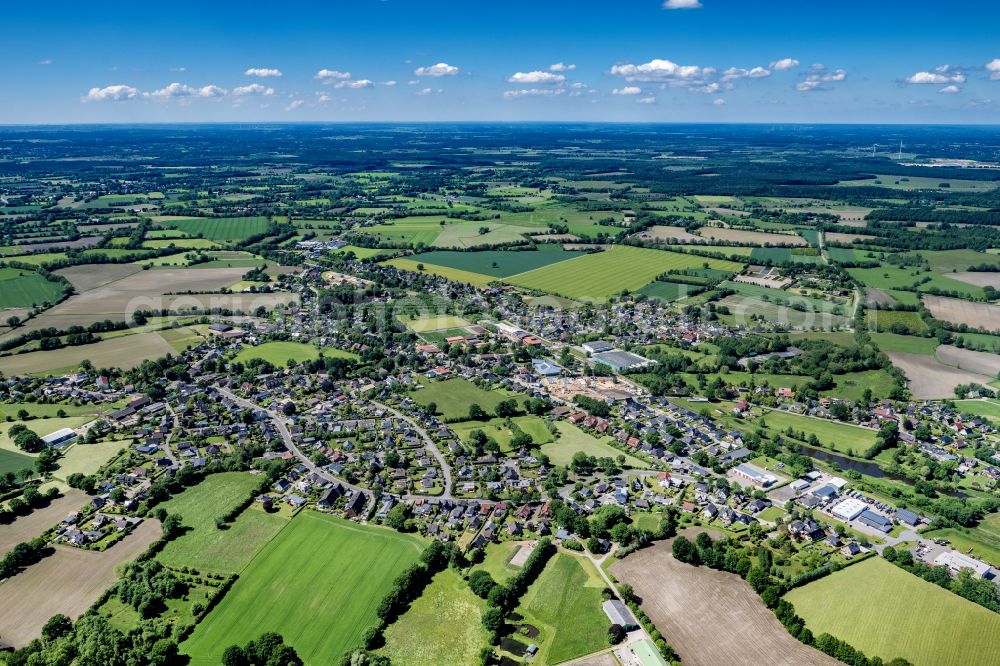 Alveslohe from above - Village view on the edge of agricultural fields and land in Alveslohe in the state Schleswig-Holstein, Germany