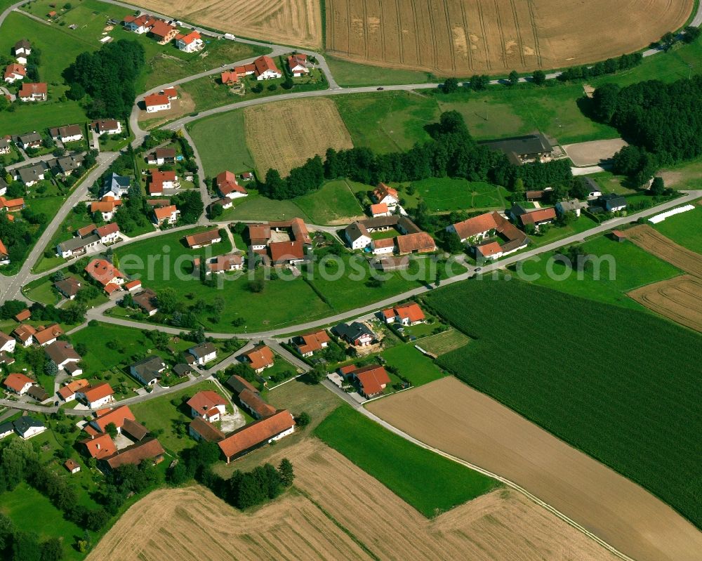 Amsham from the bird's eye view: Village view on the edge of agricultural fields and land in Amsham in the state Bavaria, Germany