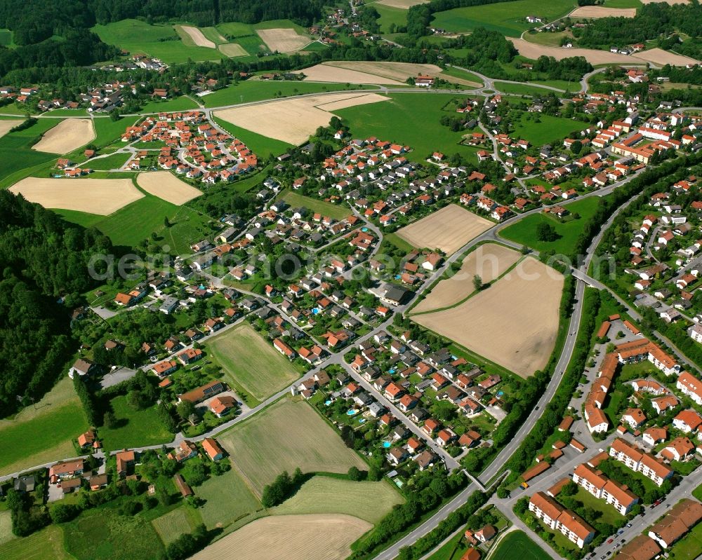 Antersdorf from the bird's eye view: Village view on the edge of agricultural fields and land in Antersdorf in the state Bavaria, Germany