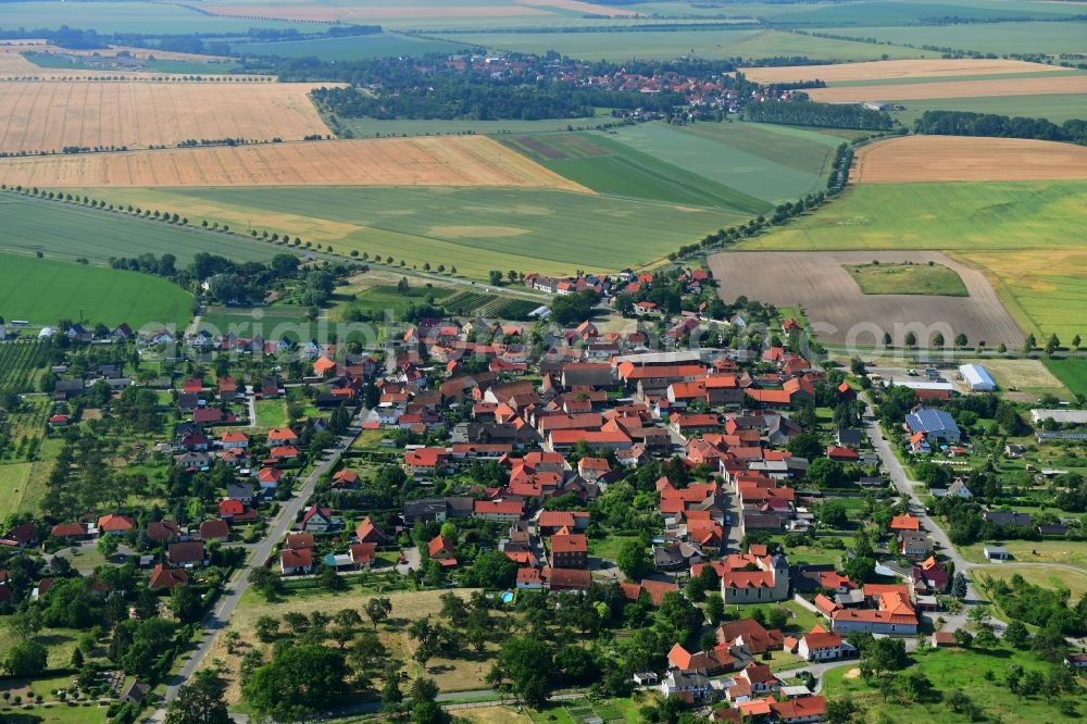 Aspenstedt from above - Village view on the edge of agricultural fields and land in Aspenstedt in the state Saxony-Anhalt, Germany