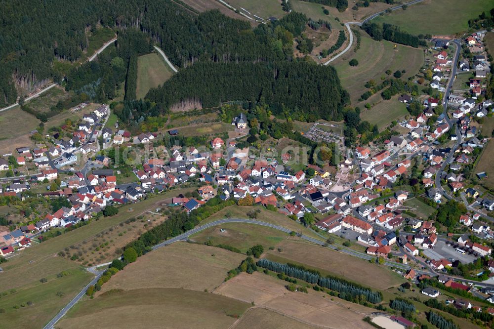 Aerial image Aura im Sinngrund - Village view on the edge of agricultural fields and land in Aura im Sinngrund in the state Bavaria, Germany