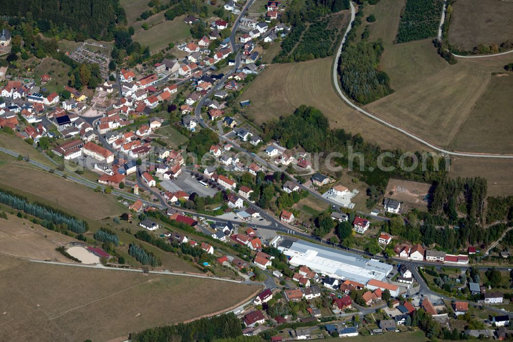 Aerial photograph Aura im Sinngrund - Village view on the edge of agricultural fields and land in Aura im Sinngrund in the state Bavaria, Germany