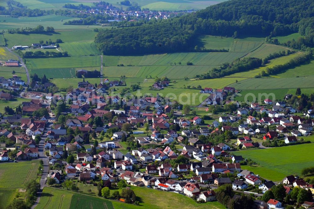 Ausbach from above - Village view on the edge of agricultural fields and land in Ausbach in the state Hesse, Germany