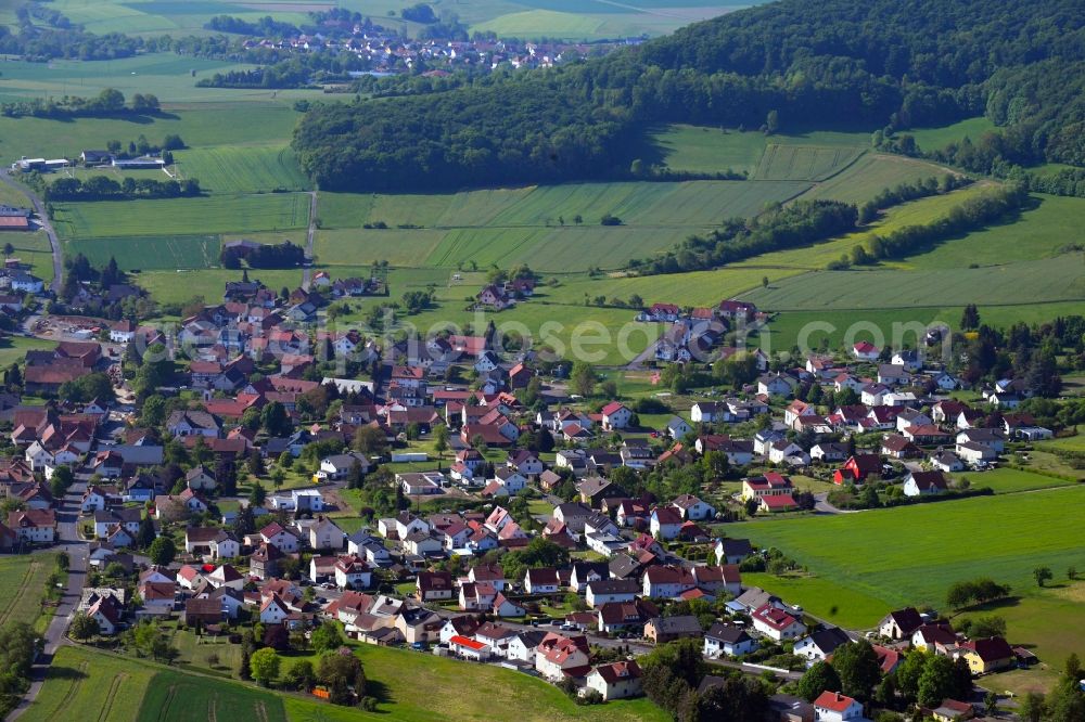 Ausbach from the bird's eye view: Village view on the edge of agricultural fields and land in Ausbach in the state Hesse, Germany