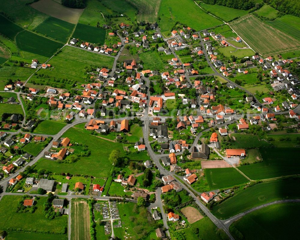 Ausbach from above - Village view on the edge of agricultural fields and land in Ausbach in the state Hesse, Germany