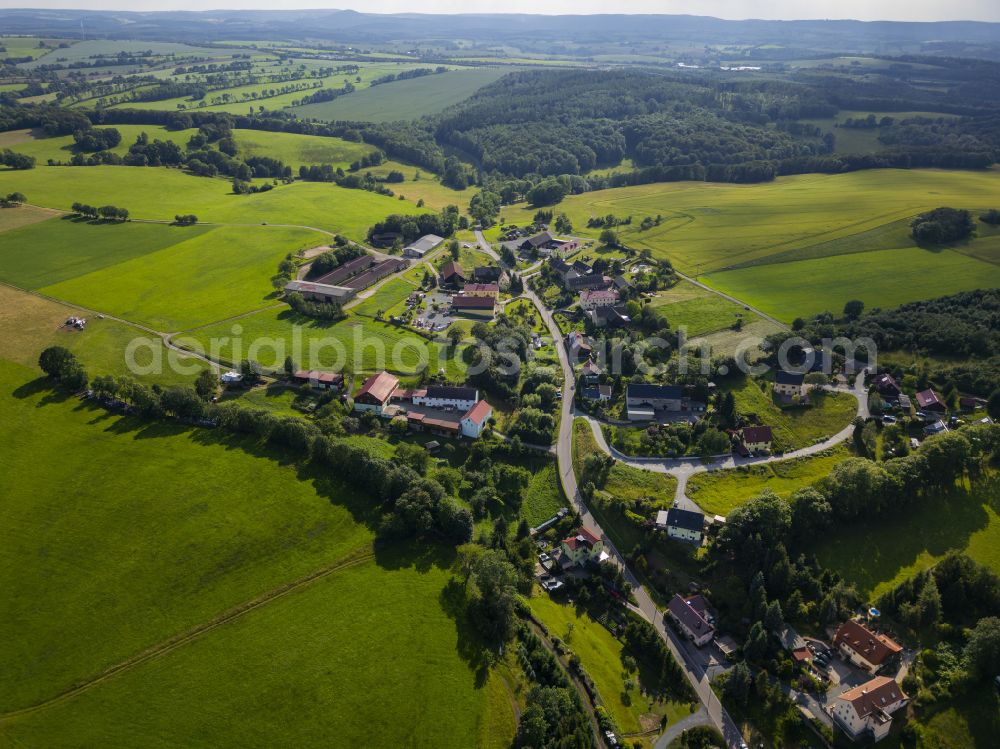 Bad Gottleuba-Berggießhübel from the bird's eye view: Village view on the edge of agricultural fields and land in the district Hartmannsbach in Bad Gottleuba-Berggiesshuebel in the state Saxony, Germany