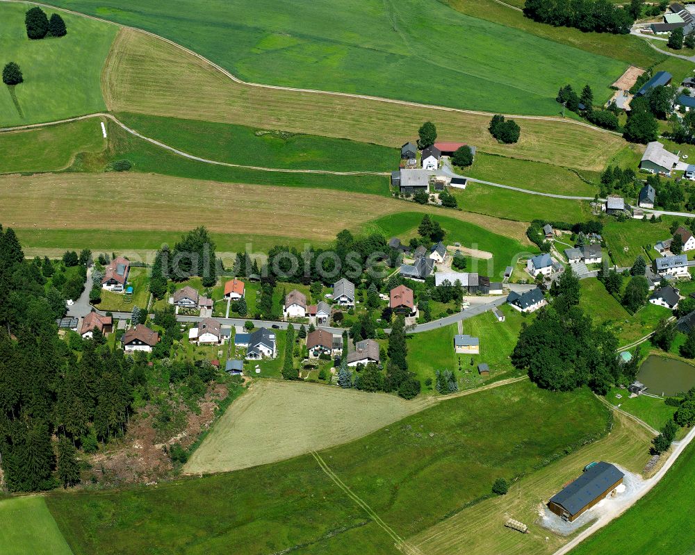 Bad Steben from above - Village view on the edge of agricultural fields and land on street Bachwiesenstrasse in the district Obersteben in Bad Steben Oberfranken in the state Bavaria, Germany