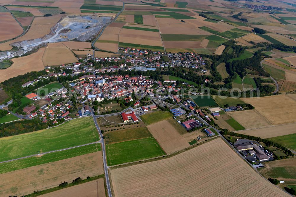 Aerial photograph Baldersheim - Village view on the edge of agricultural fields and land in Baldersheim in the state Bavaria, Germany