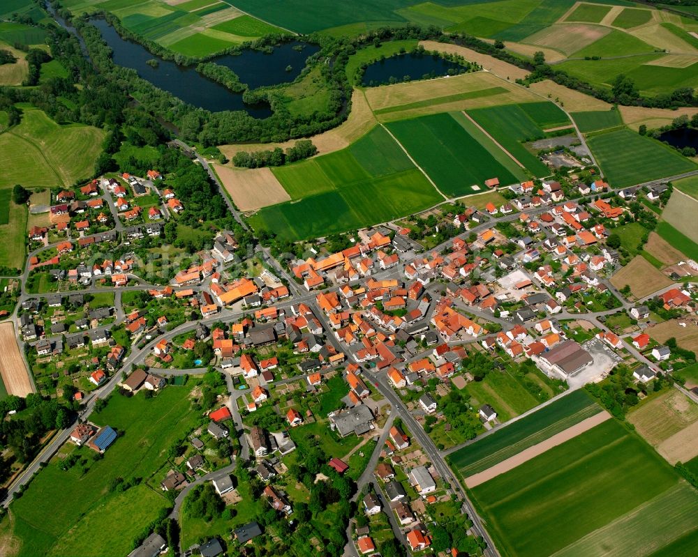 Aerial photograph Baumbach - Village view on the edge of agricultural fields and land in Baumbach in the state Hesse, Germany