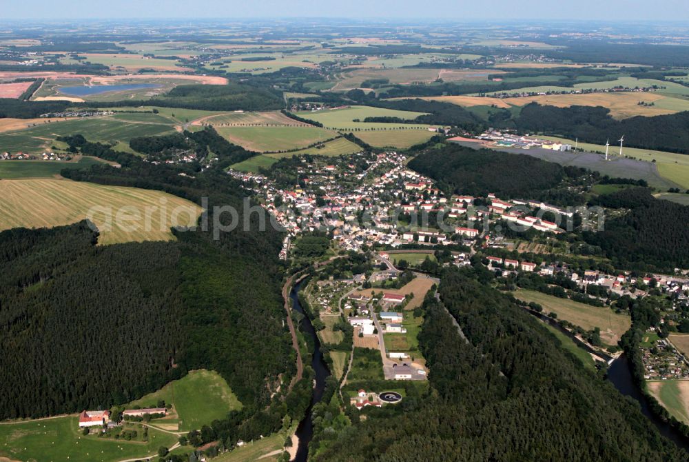 Berga from the bird's eye view: Village view on the edge of agricultural fields and land in Berga in the state Thuringia, Germany