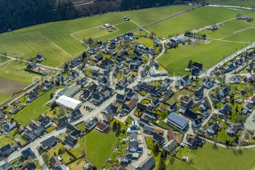 Aerial image Berghausen - Village view on the edge of agricultural fields and land on street Berghaeuser Strasse in Berghausen in the state North Rhine-Westphalia, Germany