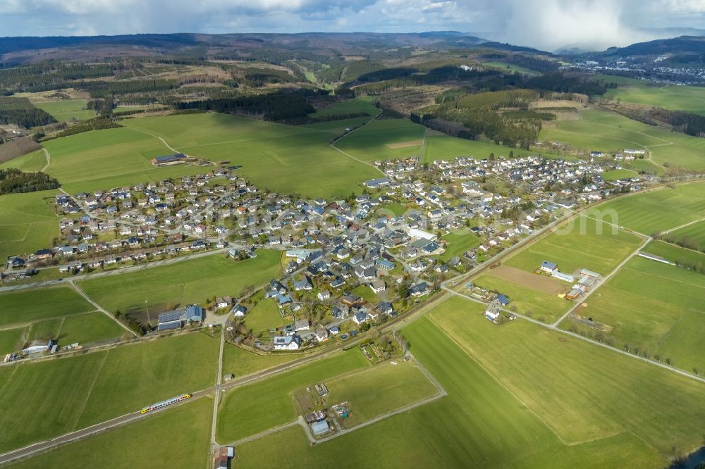 Berghausen from the bird's eye view: Village view on the edge of agricultural fields and land on street Berghaeuser Strasse in Berghausen in the state North Rhine-Westphalia, Germany