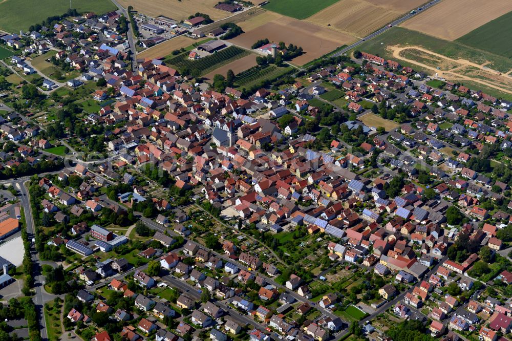 Bergtheim from above - Village view on the edge of agricultural fields and land in Bergtheim in the state Bavaria, Germany