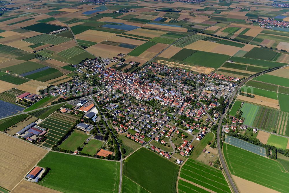 Bergtheim from the bird's eye view: Village view on the edge of agricultural fields and land in Bergtheim in the state Bavaria, Germany