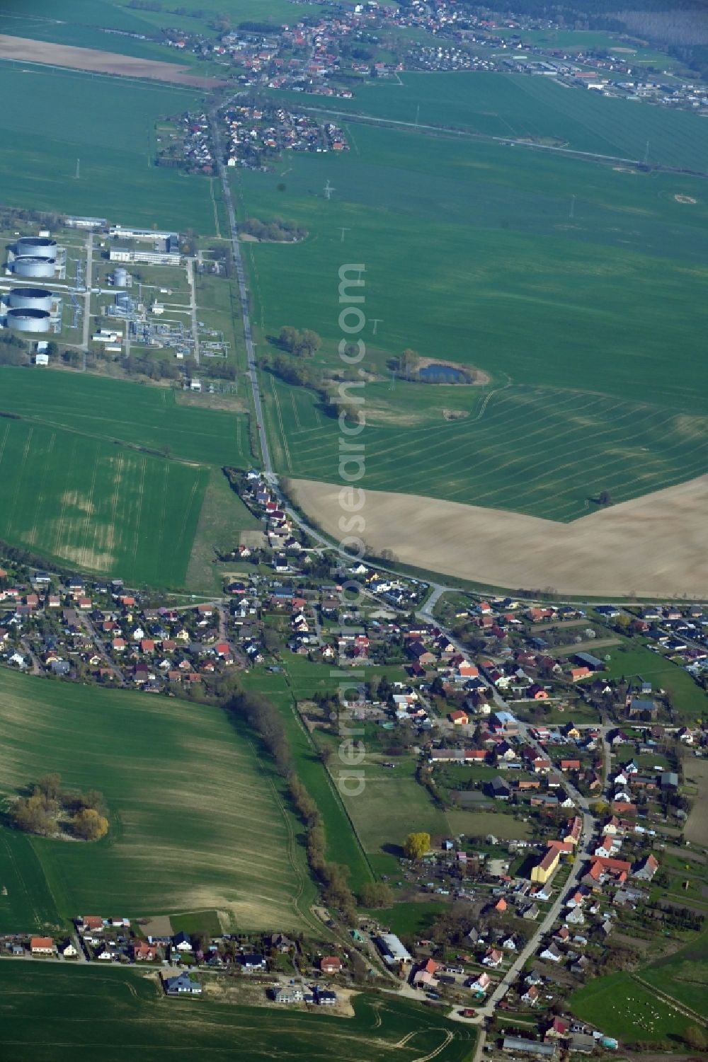 Berkholz-Meyenburg from above - Village view on the edge of agricultural fields and land in Berkholz-Meyenburg in the state Brandenburg, Germany