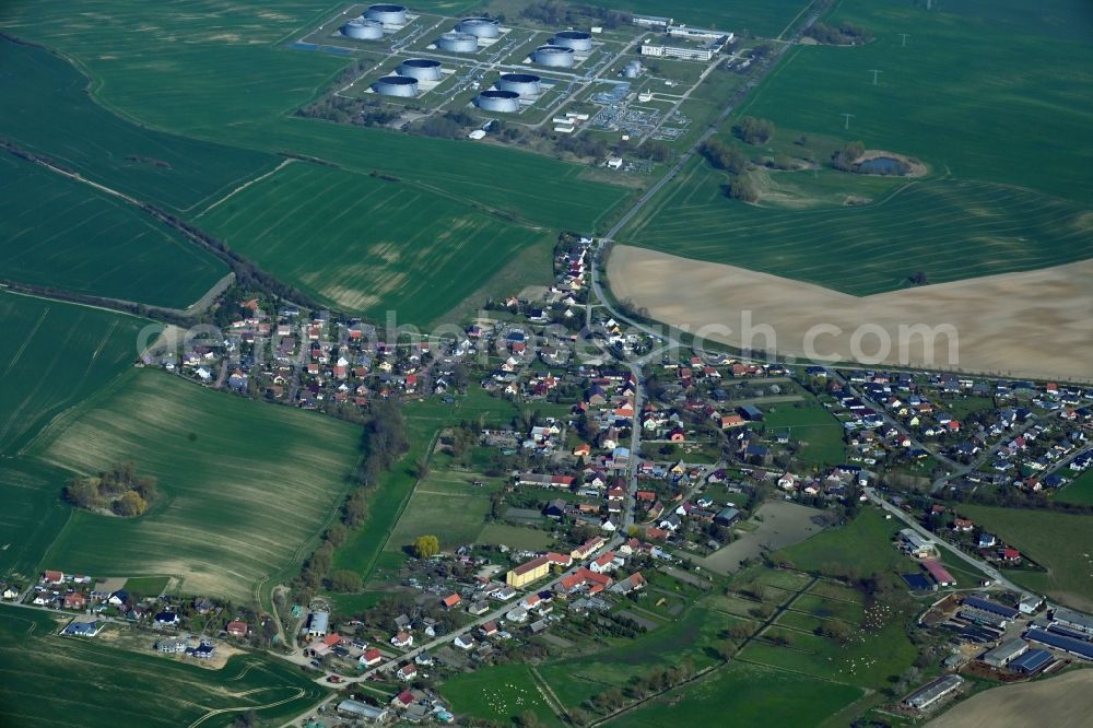 Aerial image Berkholz-Meyenburg - Village view on the edge of agricultural fields and land in Berkholz-Meyenburg in the state Brandenburg, Germany