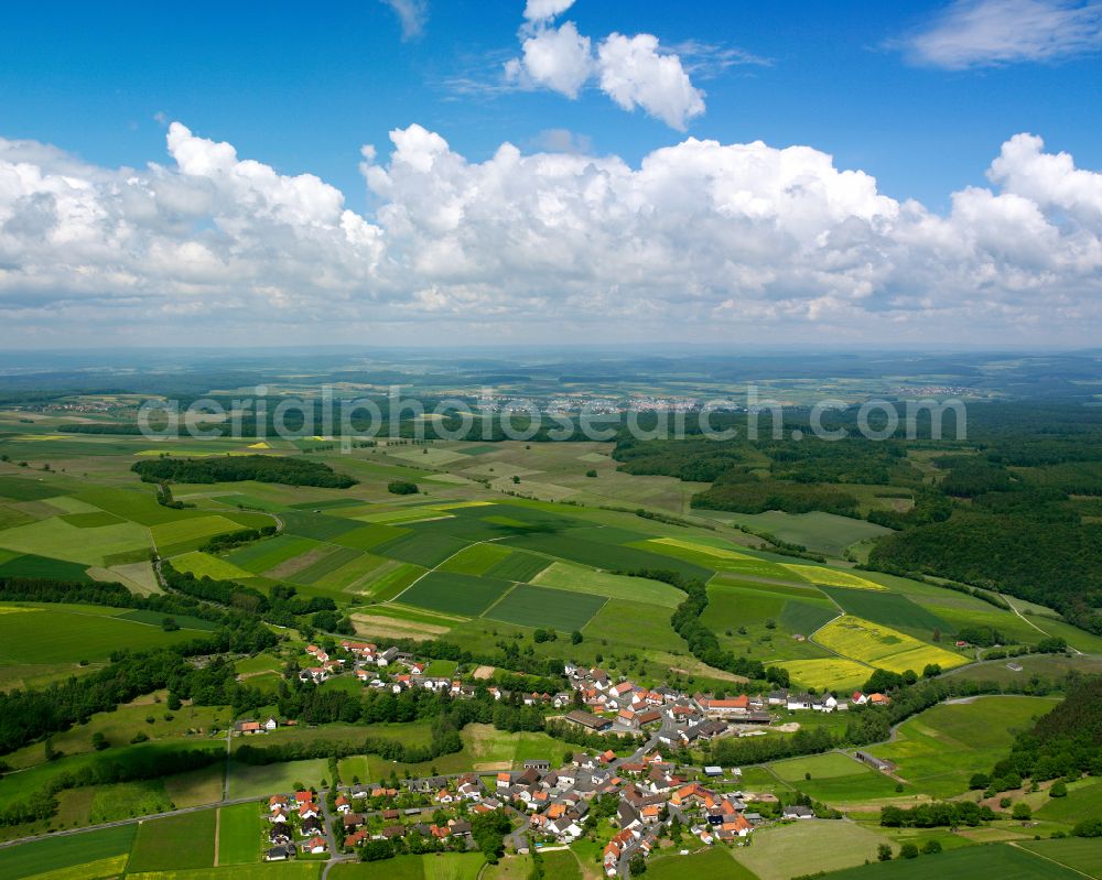 Aerial image Bernsburg - Village view on the edge of agricultural fields and land in Bernsburg in the state Hesse, Germany