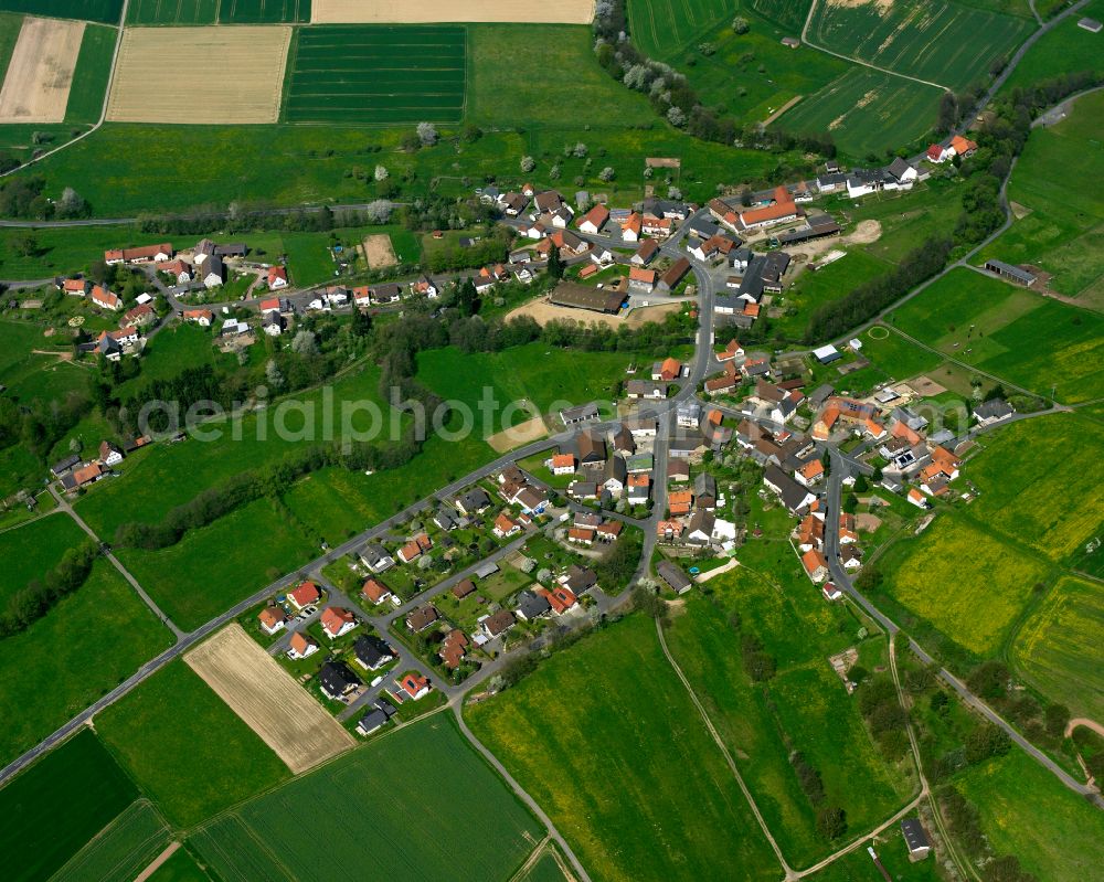 Aerial image Bernsburg - Village view on the edge of agricultural fields and land in Bernsburg in the state Hesse, Germany