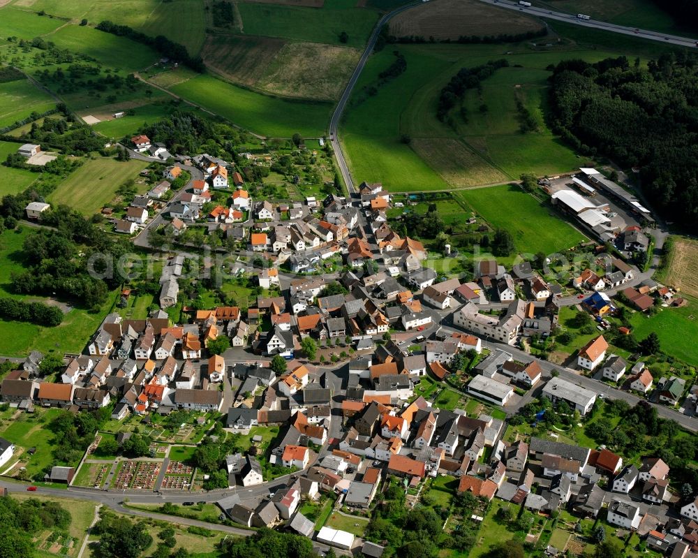 Bersrod from the bird's eye view: Village view on the edge of agricultural fields and land in Bersrod in the state Hesse, Germany