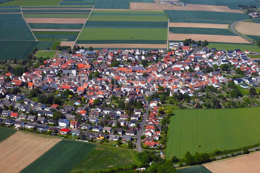 Aerial image Berstadt - Village view on the edge of agricultural fields and land in Berstadt in the state Hesse, Germany