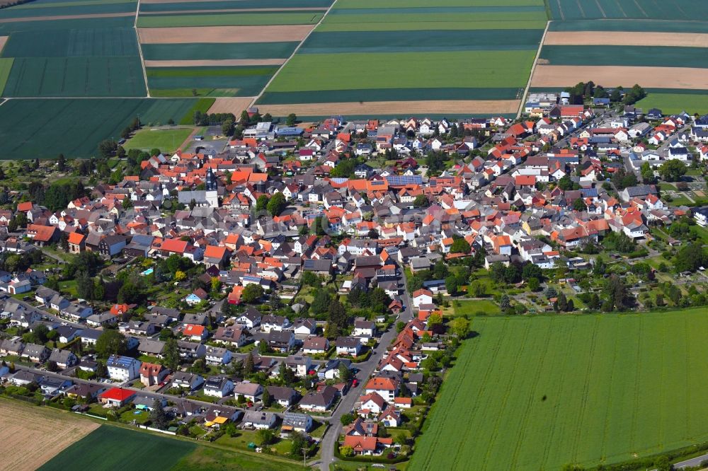 Berstadt from above - Village view on the edge of agricultural fields and land in Berstadt in the state Hesse, Germany