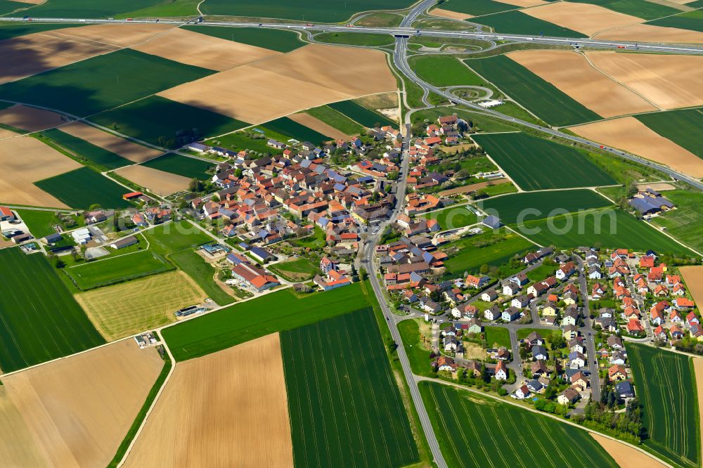 Aerial image Biebelried - Village view on the edge of agricultural fields and land in Biebelried in the state Bavaria, Germany