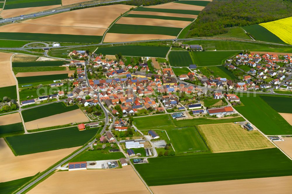 Biebelried from above - Village view on the edge of agricultural fields and land in Biebelried in the state Bavaria, Germany