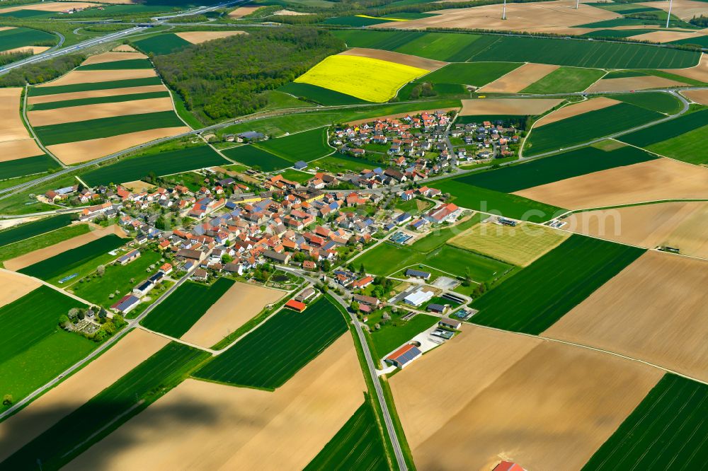 Biebelried from the bird's eye view: Village view on the edge of agricultural fields and land in Biebelried in the state Bavaria, Germany