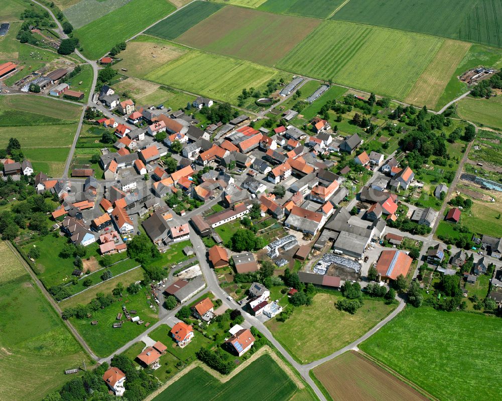 Aerial image Bleidenrod - Village view on the edge of agricultural fields and land in Bleidenrod in the state Hesse, Germany