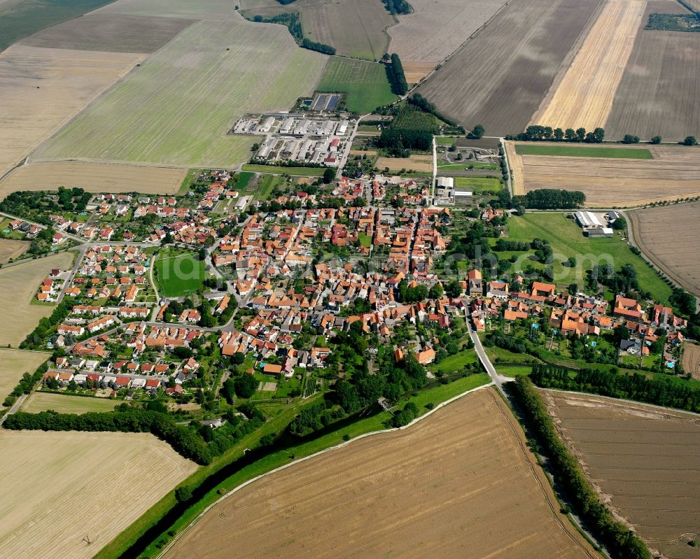 Bollstedt from the bird's eye view: Village view on the edge of agricultural fields and land in Bollstedt in the state Thuringia, Germany