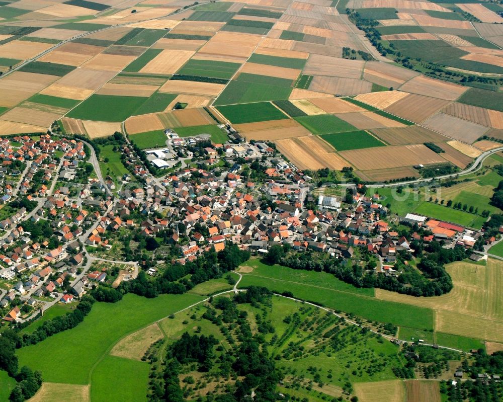 Brettach from the bird's eye view: Village view on the edge of agricultural fields and land in Brettach in the state Baden-Wuerttemberg, Germany