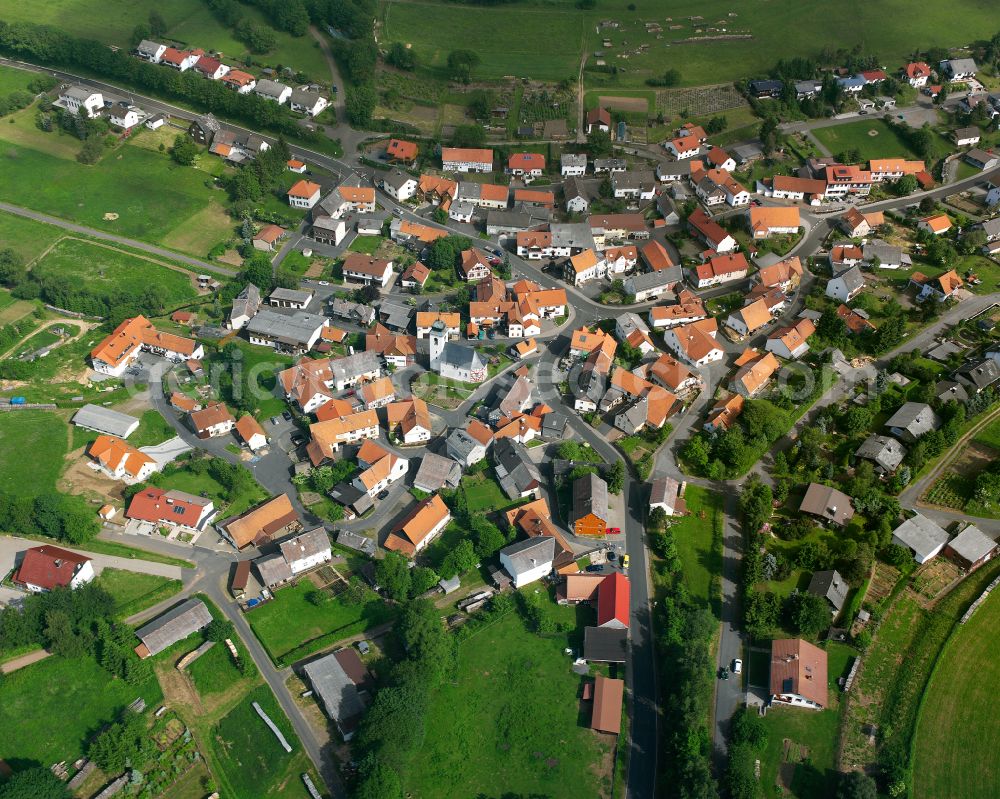 Breungeshain from above - Village view on the edge of agricultural fields and land in Breungeshain in the state Hesse, Germany