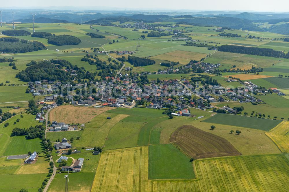 Aerial photograph Brilon - Village view on the edge of agricultural fields and land in Brilon at Sauerland in the state North Rhine-Westphalia, Germany