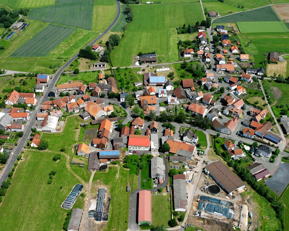 Aerial photograph Büßfeld - Village view on the edge of agricultural fields and land in Büßfeld in the state Hesse, Germany